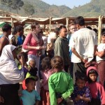 ROGHINGYA An assessment team talks to displaced people in Pauktaw camp in rural Rakhine, Myanmar, where more than 20,000 Rohingya live. Photo- OCHA:Kirsten Mildren